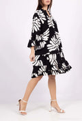 Short fluid dress with flared sleeve and front buttoning